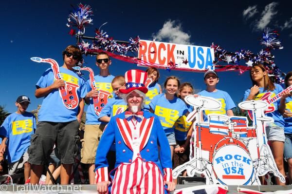 One of the many parade floats getting ready to follow the riders up Main Street.