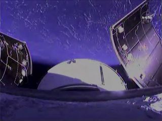 Orion capsule's service panels separate and fall back to Earth after launch from Cape Canaveral, Florida, on Dec. 5, 2014.