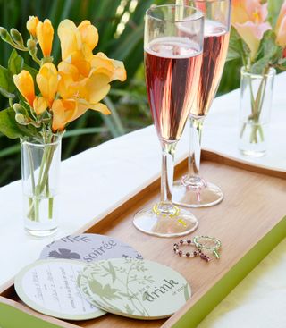 garden with champagne filled glasses