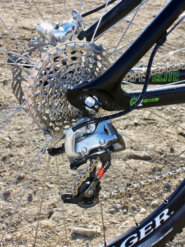 A SRAM XX rear derailleur moves the PC-1090R chain across the 11-36T cassette.