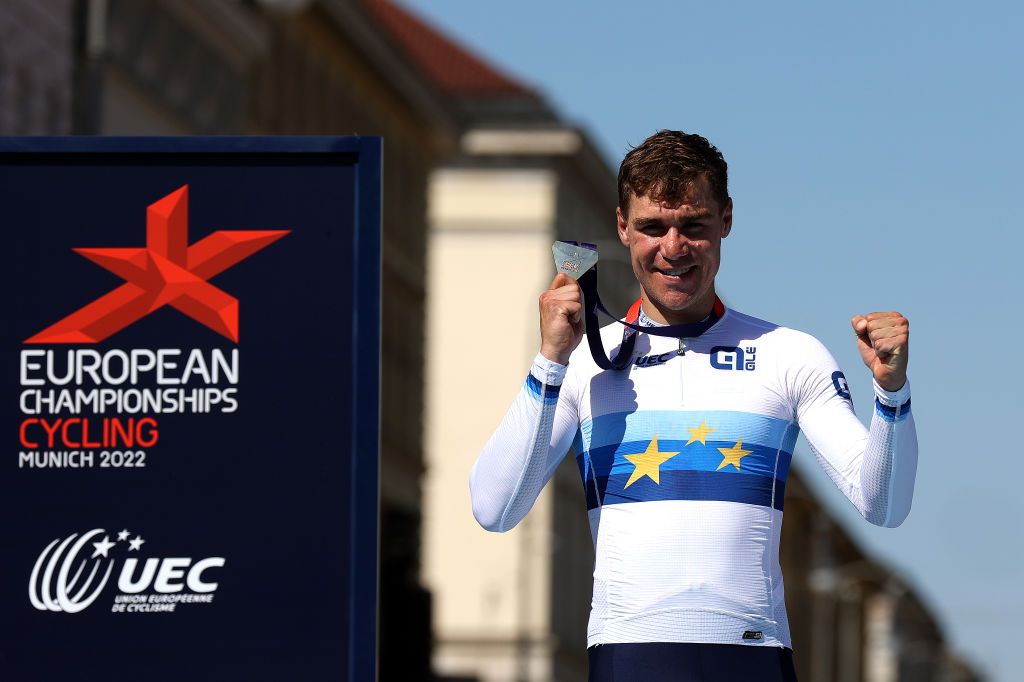 MUNICH GERMANY AUGUST 14 Gold medalist Fabio Jakobsen of Netherlands celebrates winning during the medal ceremony after the 28th UEC Road Cycling European Championships 2022 Mens Road Race a 2079km one day race from Murnau to Munich EuroRoad22 Munich2022 on August 14 2022 in Munich Germany Photo by Jan HetfleischGetty Images