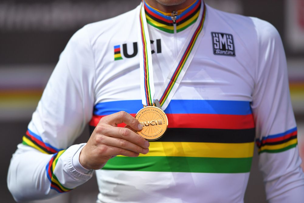Rohan Dennis shows off his gold medal from the 2018 UCI Road World championships time trial