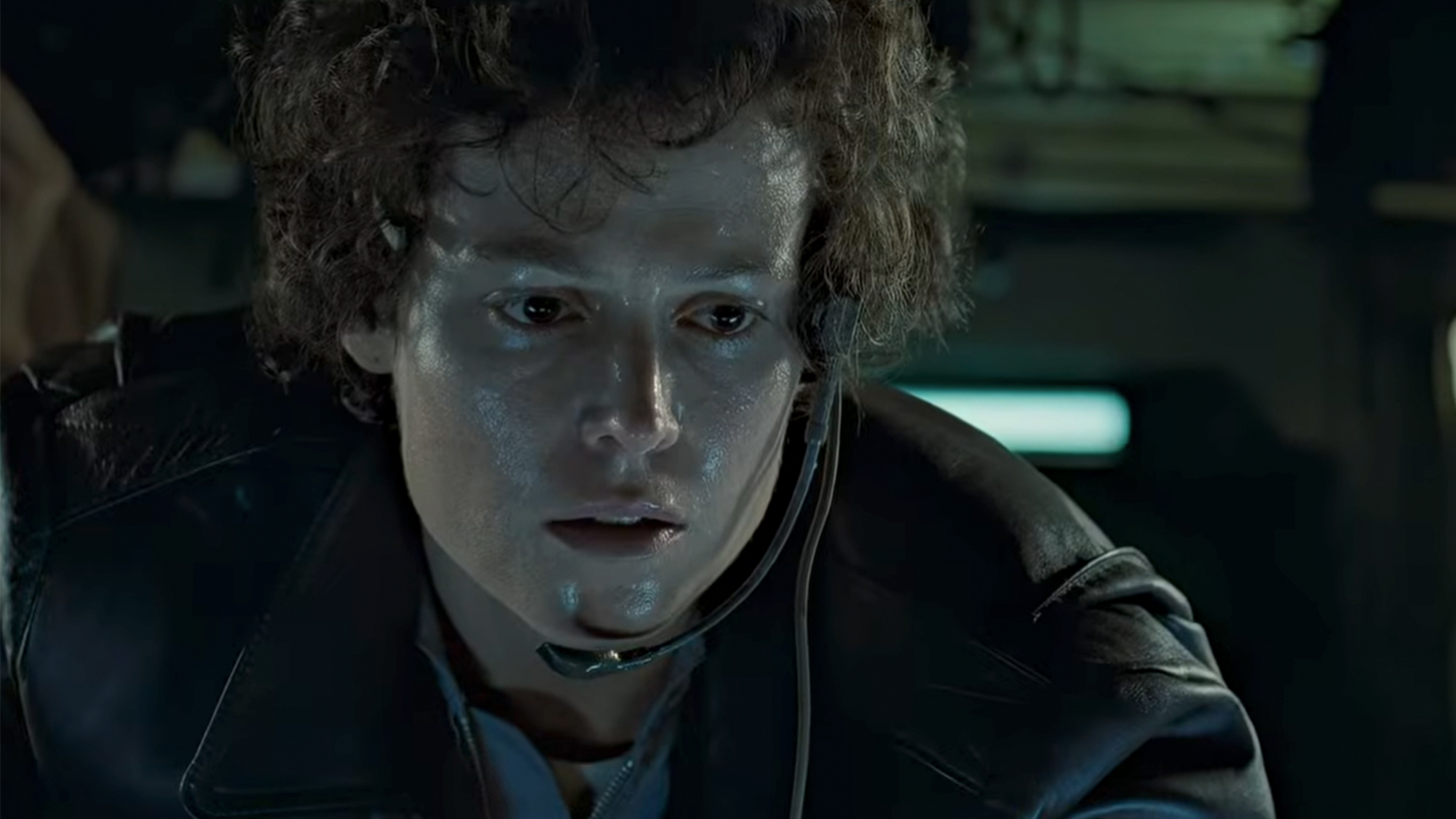 Sigourney Weaver sweating and wearing a headset in Aliens