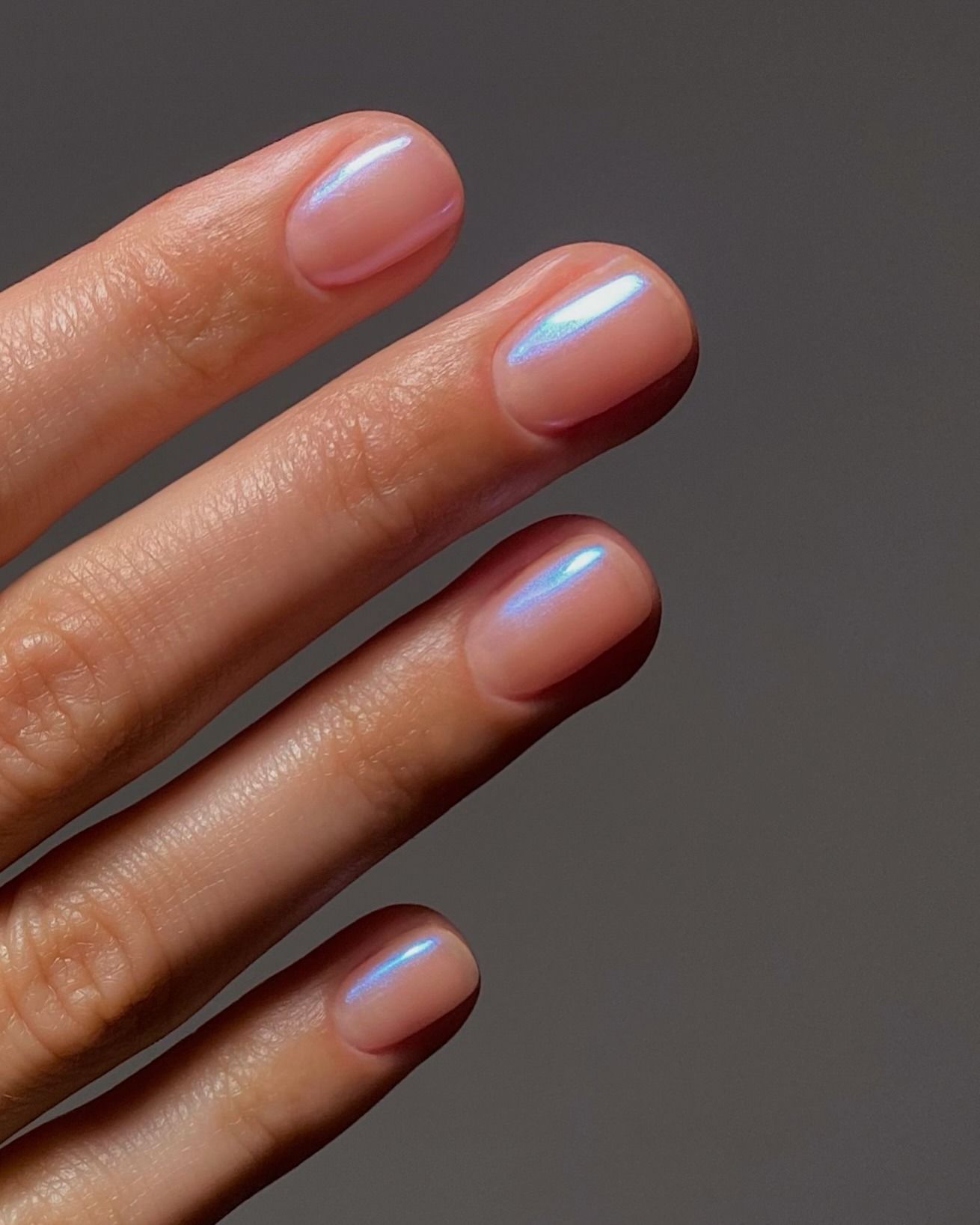 A side angle of @matejanova's blue chrome nails