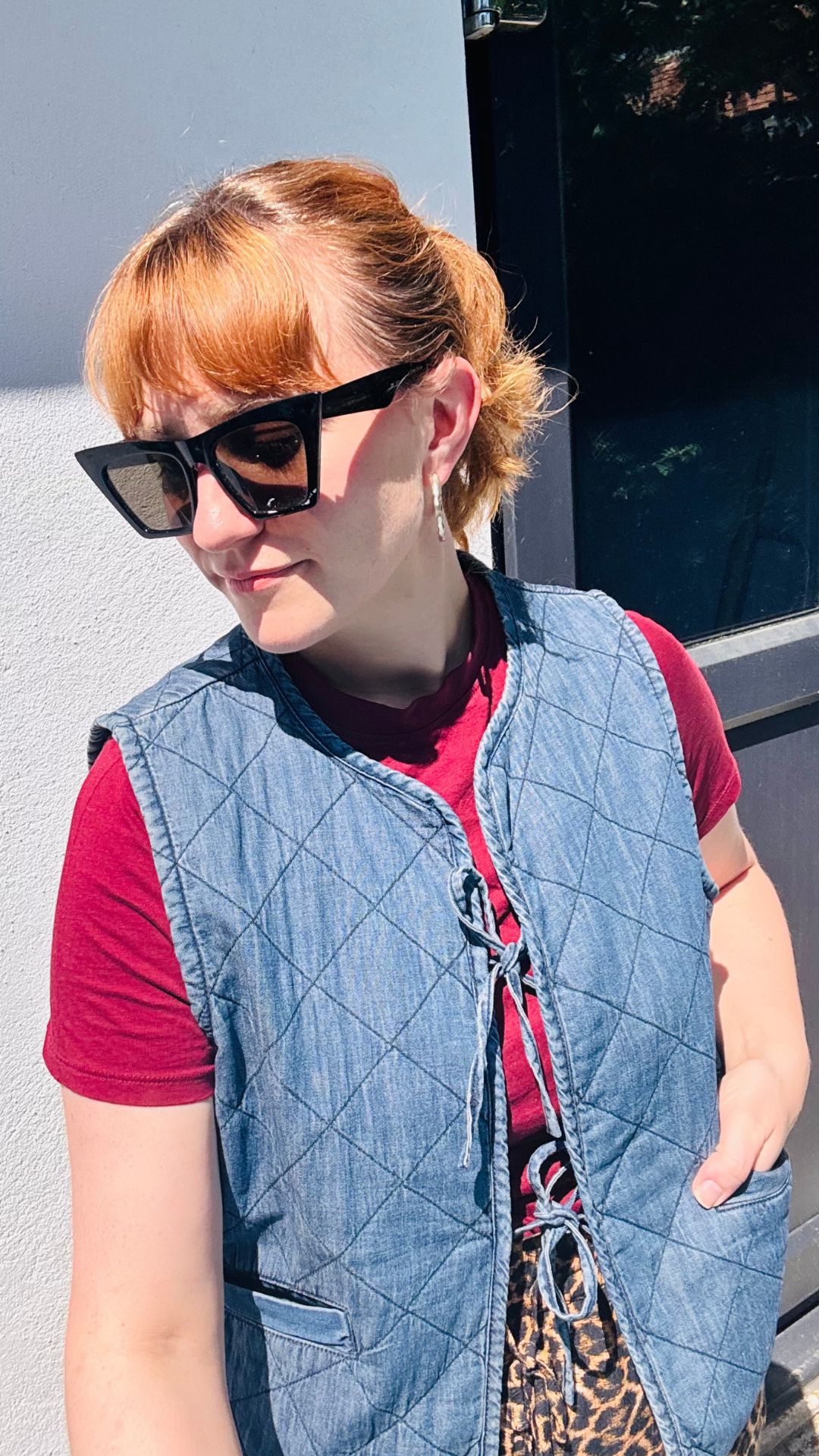 MATILDA WEARING A DENIM WAISTCOAT