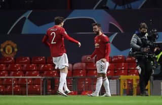 Bruno Fernandes, right, celebrates his first goal