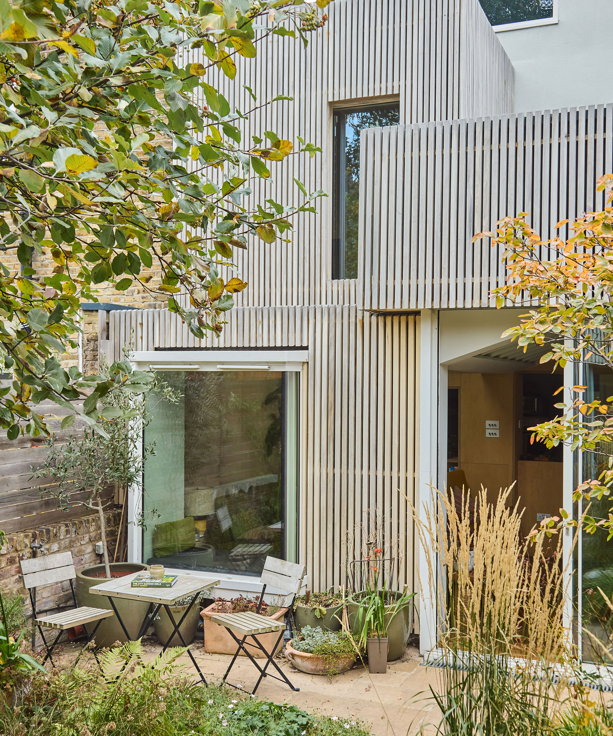 exterior of a renovated house and extended house with timber cladding on the exterior