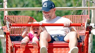 Lena Tindall and Mike Tindall ride on a Ferris wheel