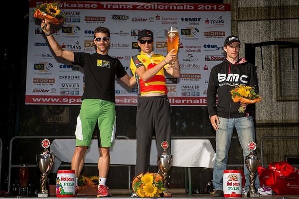 Men's overall podium: Alban Lakata, Christoph Sauser, Moritz Milatz