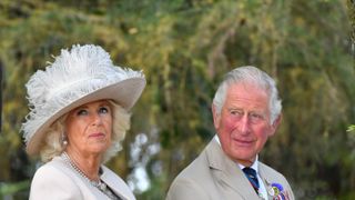 alrewas, staffordshire august 15 prince charles, prince of wales and camilla, duchess of cornwall attend a national service of remembrance, marking the 75th anniversary of vj day, at the national memorial arboretum on august 15, 2020 in alrewas, staffordshire, england photo by anthony devlin wpa poolgetty images