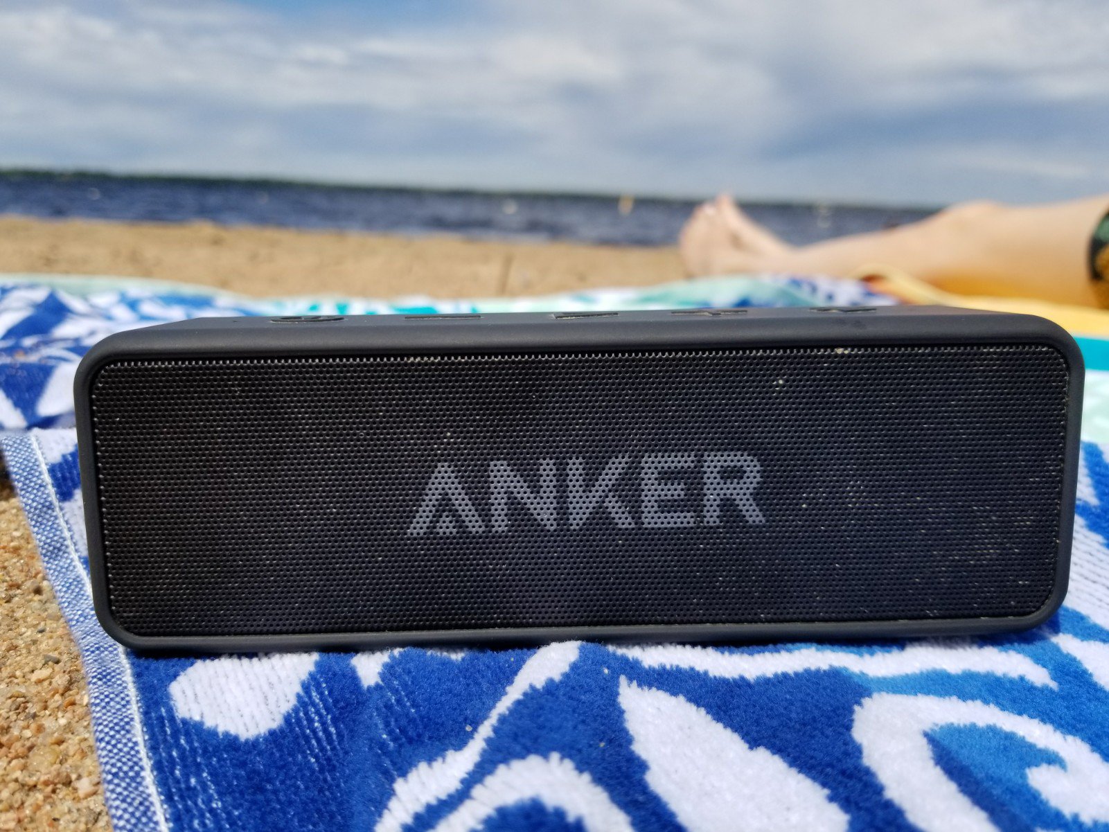 Anker Soundcore 2 sitting on beach towel