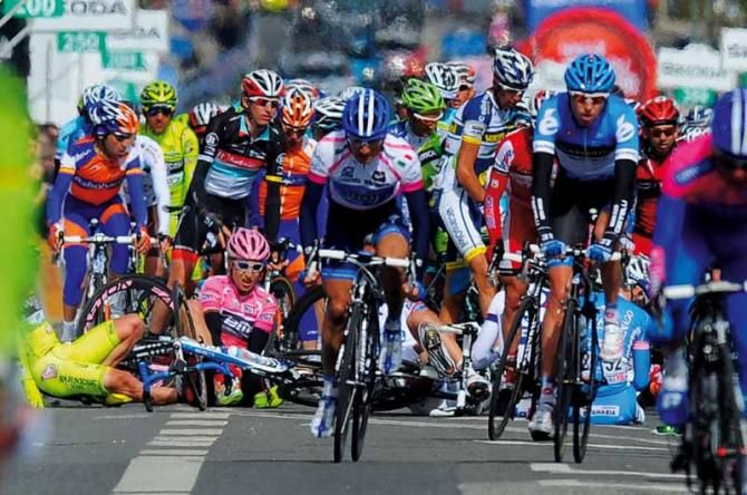 Stage 3 of the Giro d'Italia and race leader Taylor Phinney finds himself on the tarmac after a high-speed crash.