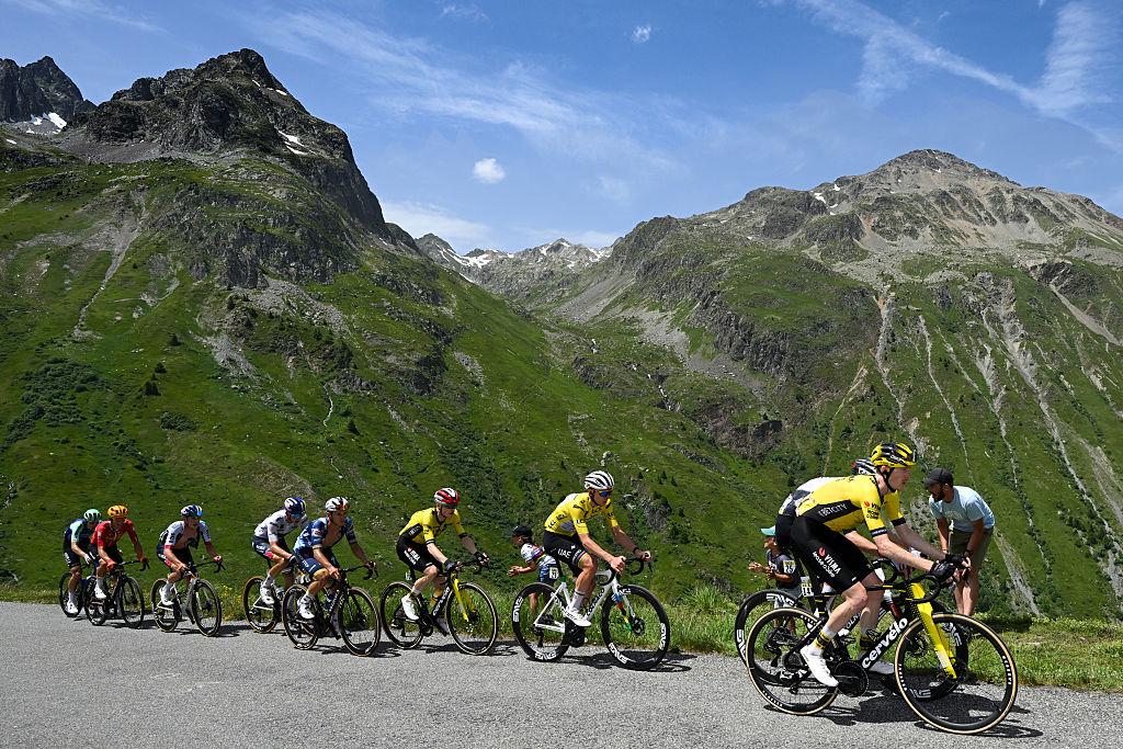 VALMEINIER 1800, FRANCE - JUNE 14: (L-R) Jonas Vingegaard of Denmark and Team Visma | Lease a Bike, Tadej Pogacar of Slovenia and UAE Team Emirates - XRG - Yellow Leader Jersey and Matteo Jorgenson of United States and Team Visma | Lease a Bike compete climbing the Col de la Croix de Fer (2036m) during the 77th Criterium du Dauphine 2025, Stage 7 a 131.6km stage from Grand-Algueblanche to Valmeinier 1800 (1830m) / #UCIWT / on June 14, 2025 in Valmeinier 1800, France.