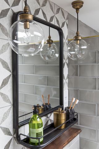 grey bathroom with vintage bathroom mirror