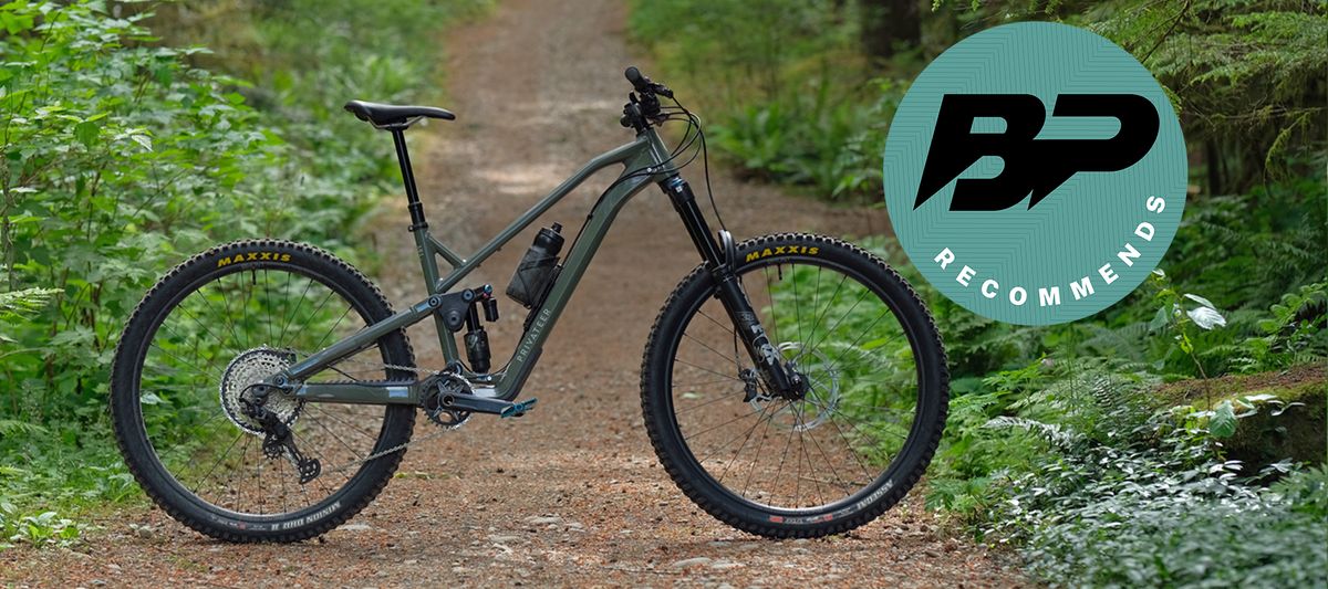 Privateer 161 Gen 2 pictured side on with a forest backdrop and a Bike Perfect Recommends review badge