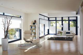 open plan style living room with lots of light and blinds