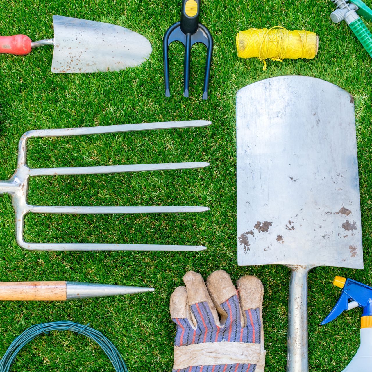 gardening tools including fork spade trowel
