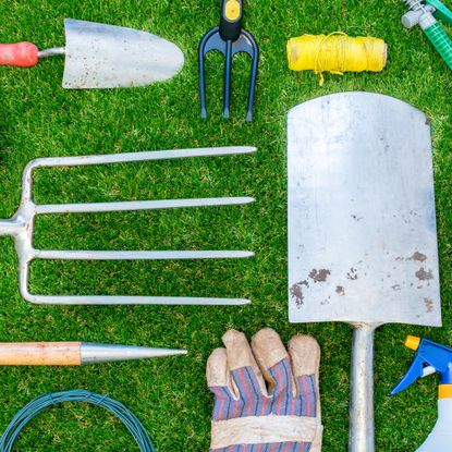gardening tools including fork spade trowel