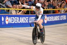 Britain's Katy Marchant celebrates after winning the Women's 500m Time Trial final race during the fourth day of the UEC European Track Cycling Championships at the Omnisport indoor arena in Apeldoorn, on January 13, 2024. (Photo by JOHN THYS / AFP)