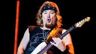 Iron Maiden’s Adrian Smith onstage at the Sonisphere festival in 2010