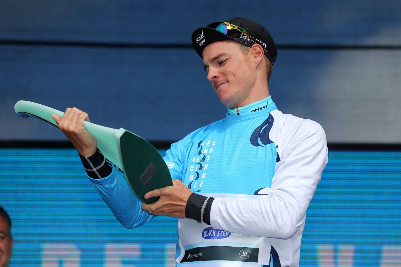 Gianni Meersman (Etixx-Quick Step) checks his trophy over
