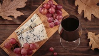 Blue cheese, wine and grapes