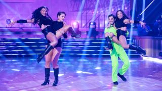 Ilona Maher and Joey Grziadei lifting Chandler Kinney and Jenn Tran during the Team Goofs dance on DWTS Disney Night for Season 33.