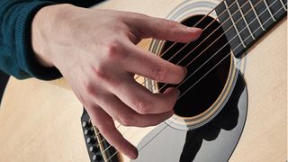 Close up of fingerpicking