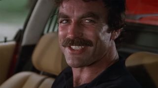 Tom Selleck stealing a car in a scene from Magnum P.I. shot in Hawaii.