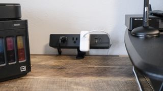 Vari's Power Hub mounted to the top of the Vari L-Shape Electric Standing Desk