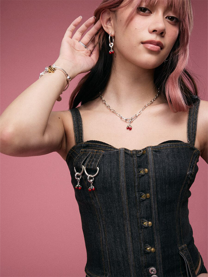 megan wears cherry charms and poses in pandok