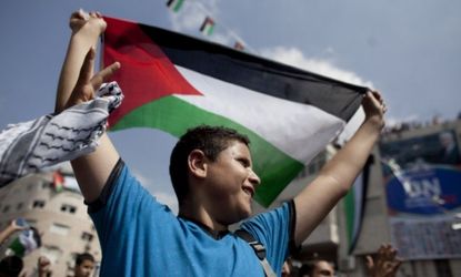 A Palestinian demonstrates in the West Bank in support of the 2011 Palestinian bid for recognition of statehood at the U.N. 