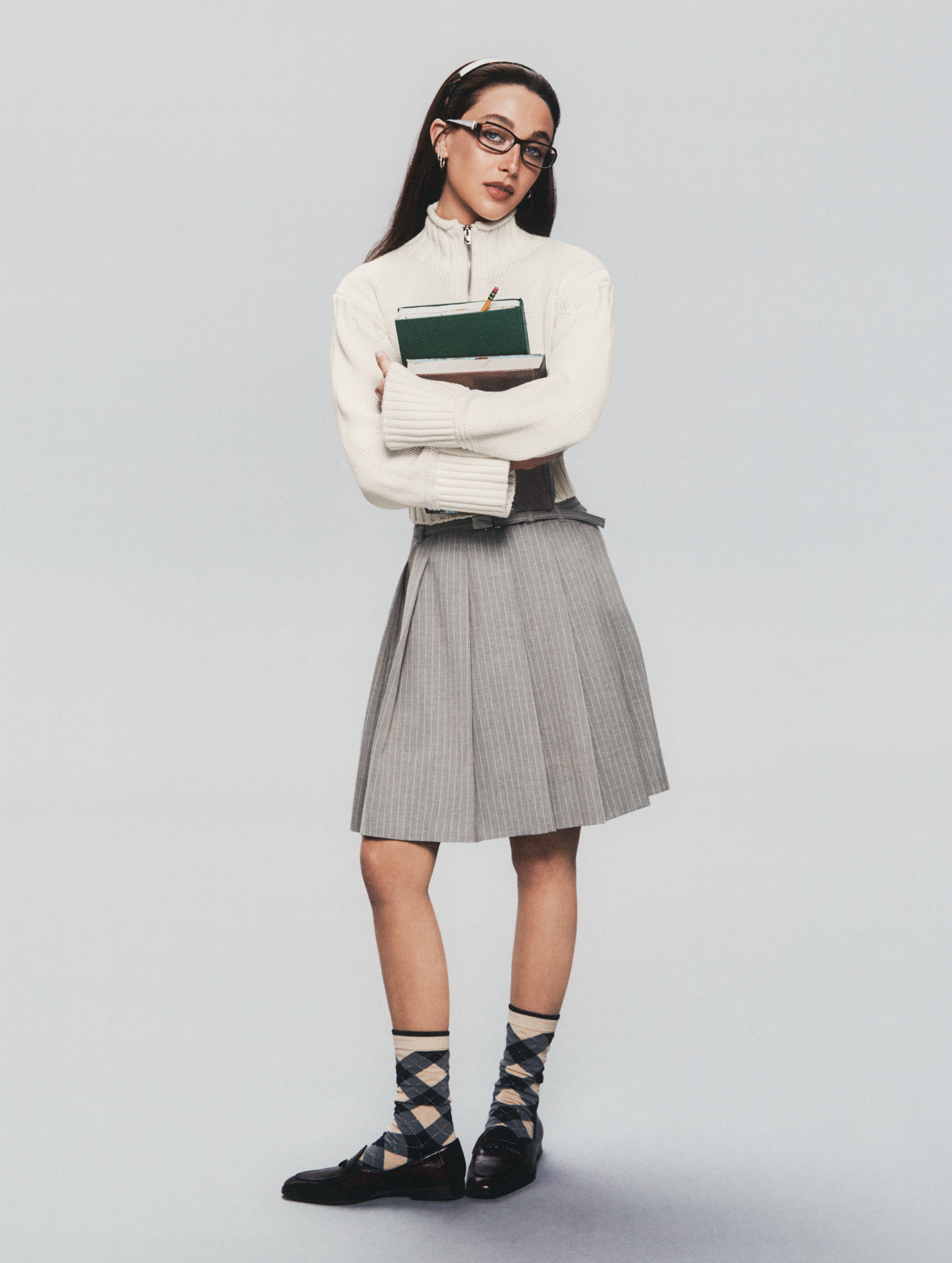 Emma Chamberlain modeled for the J.Crew Tiny Rollneck Sweater campaign