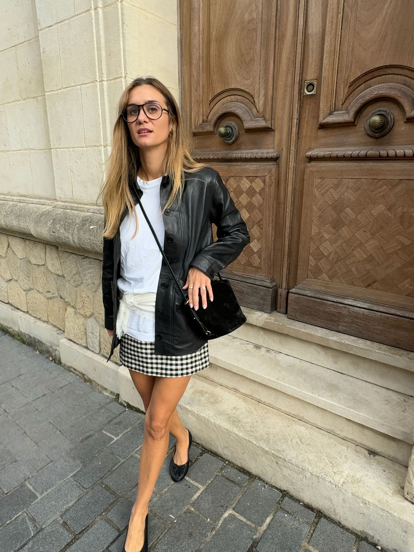 French influencer wearing a miniskirt