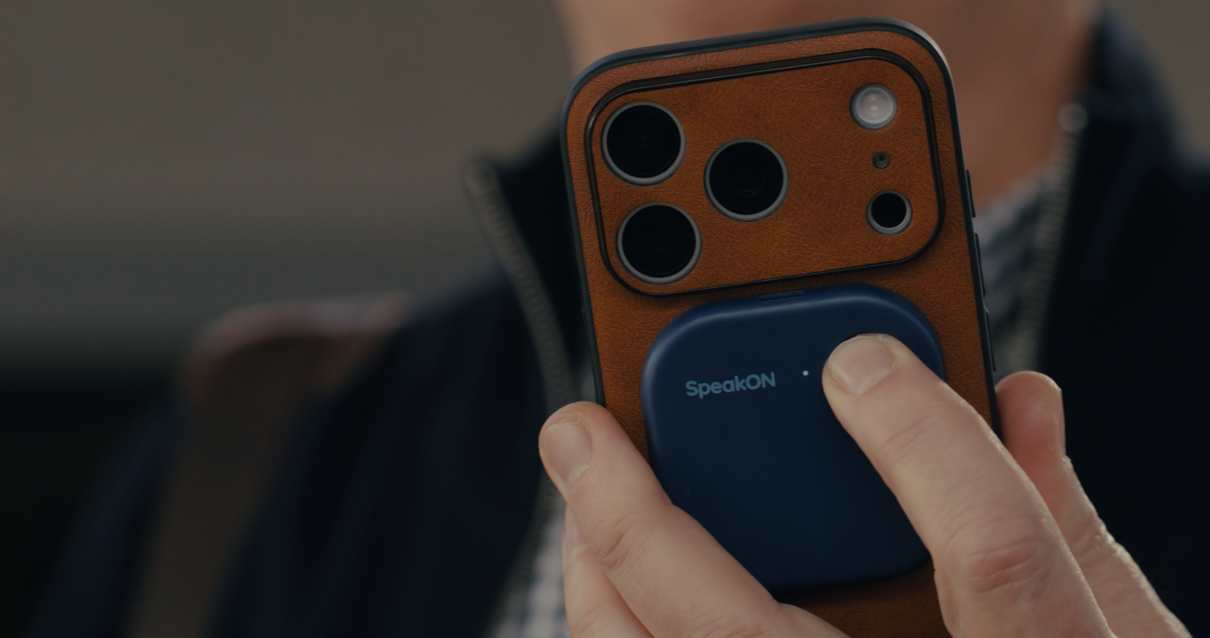 SpeakON MagSafe AI button in use by business professions using iPhones.