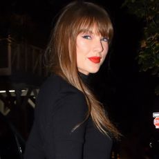 Taylor Swift sang "Love Story" at Tight End University 2026 in a little black dress with silver trim
