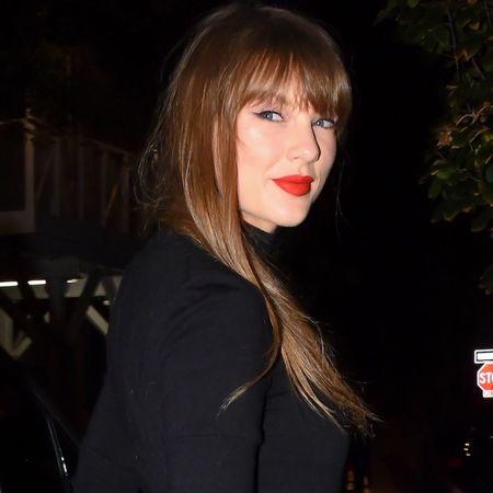 Taylor Swift sang "Love Story" at Tight End University 2026 in a little black dress with silver trim