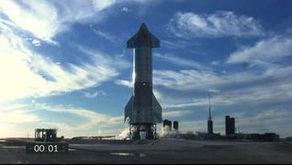 SpaceX's Starship SN8 rocket prototype stands atop its test stand at the company's Boca Chica, Texas facility during an attempted high-altitude launch test on Dec. 8, 2020. Its successor, SN9, is undergoing testing today (Jan. 20).