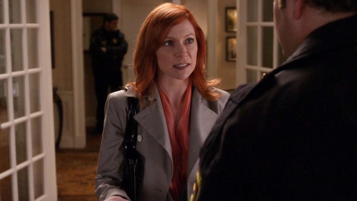 Carrie Preston as Elsbeth talking to a cop in The Good Wife.