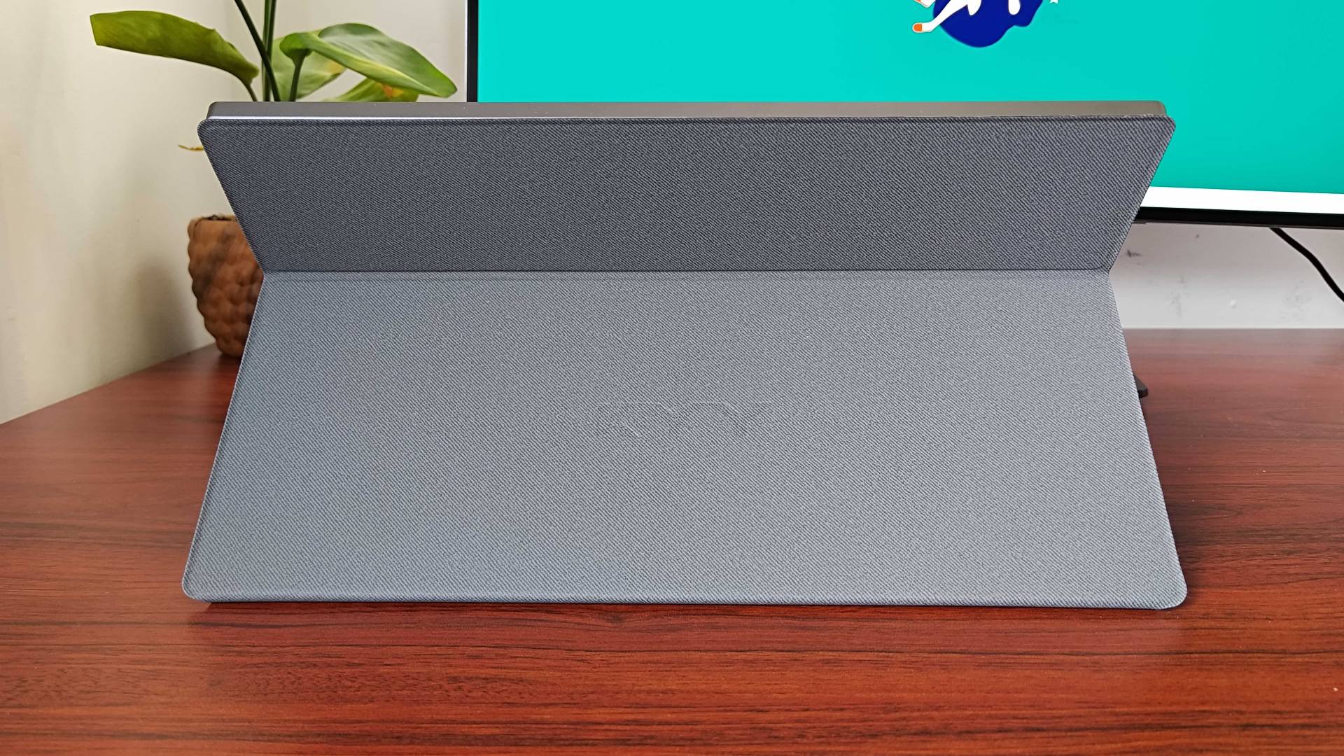 Back view of KYY Portable monitor with stand propped up