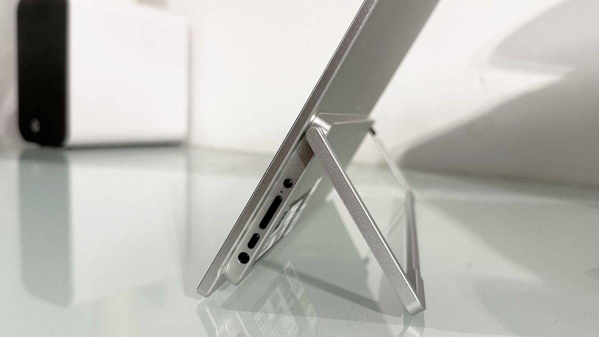Testing the Acer ProDesigner PE160WUT in a home office next to a MacBook