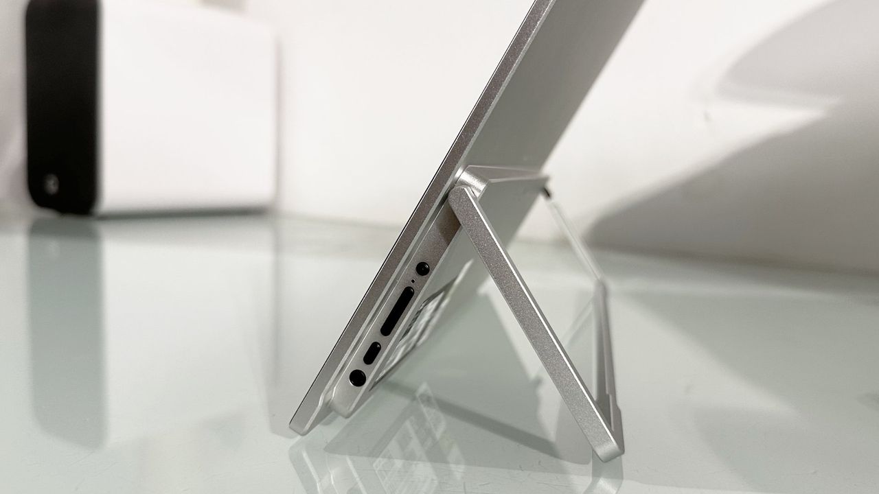 Testing the Acer ProDesigner PE160WUT in a home office next to a MacBook