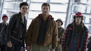 Katy O'Brien, Glen Powell and Martin Herlihy in Running Man