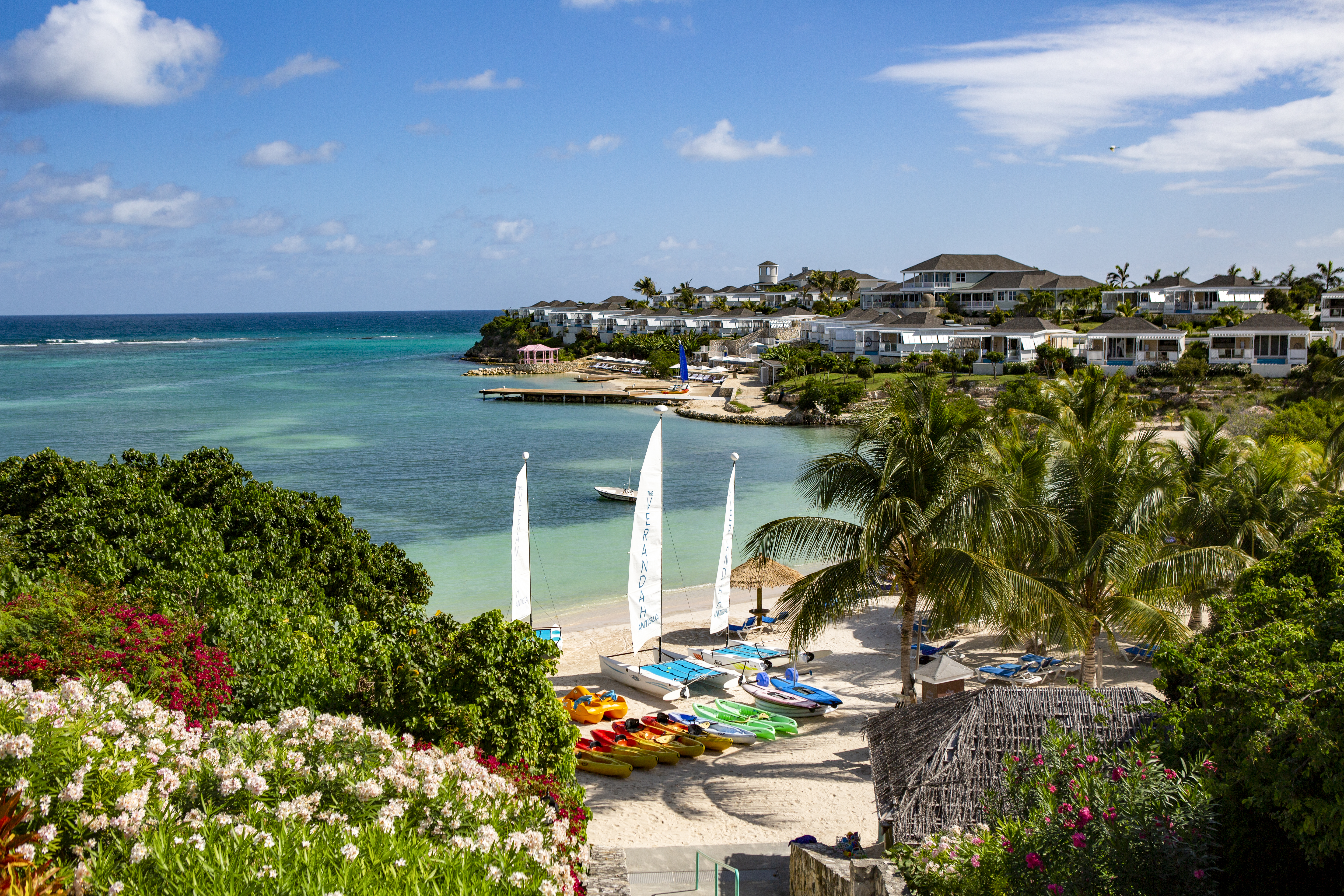 A view of the beach and villas at The Verandah Antigua.