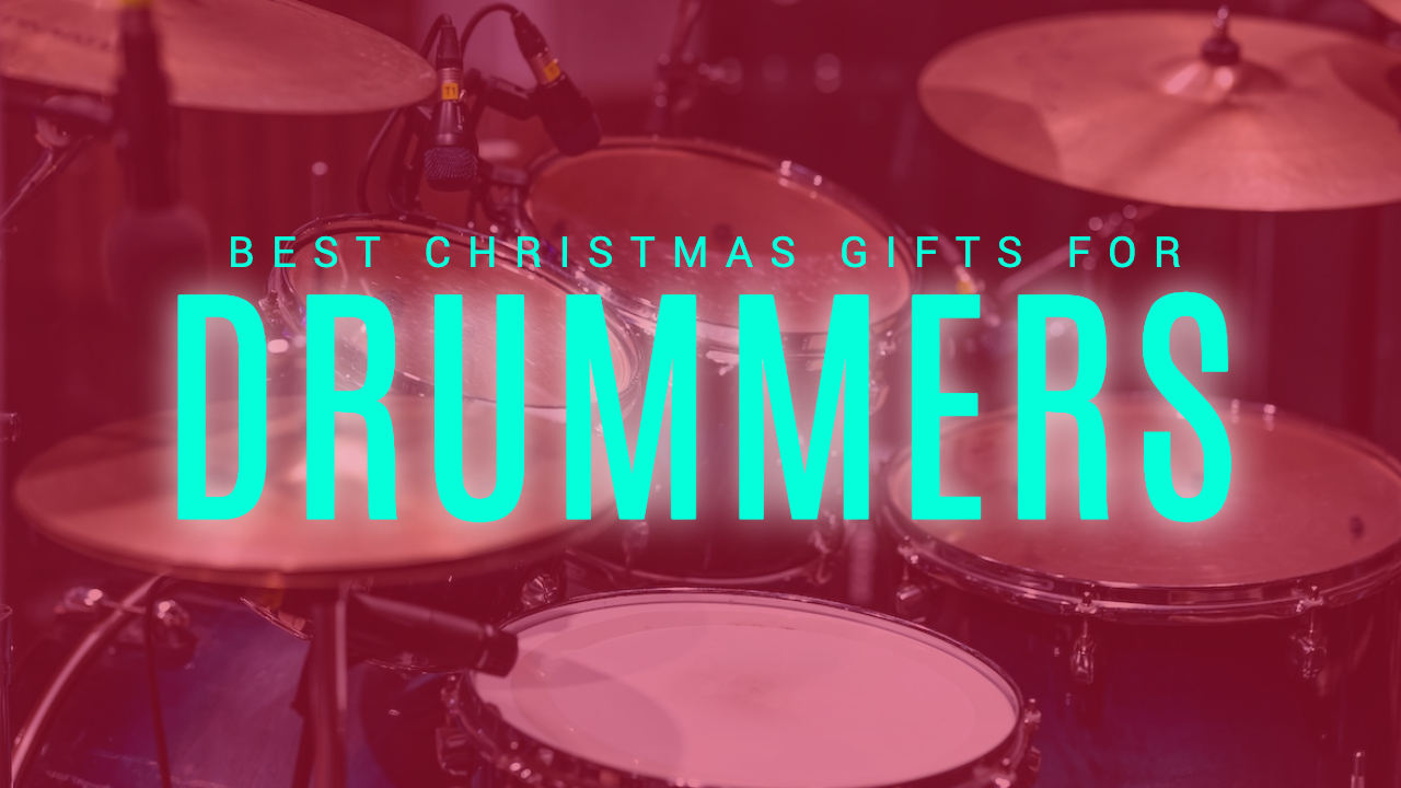 Drum kit with a red overlay and blue text saying &#039;best Christmas gifts for drummers&#039;