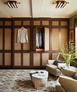 Dressing room with wooden doors on closet