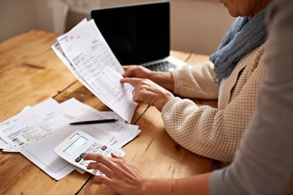Cropped view of a senior woman receiving help with her finances from her granddaughterhttp://195.154.178.81/DATA/istock_collage/0/shoots/783362.jpg