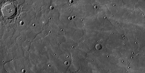 This view from NASA's Messenger spacecraft orbiting Mercury shows a region of smooth, volcanic plains that have been heavily modified by tectonic structures termed "wrinkle ridges," low, sinuous features that form when lavas cool and subside, causing the crust to contract horizontally. Image released Feb. 10, 2012.