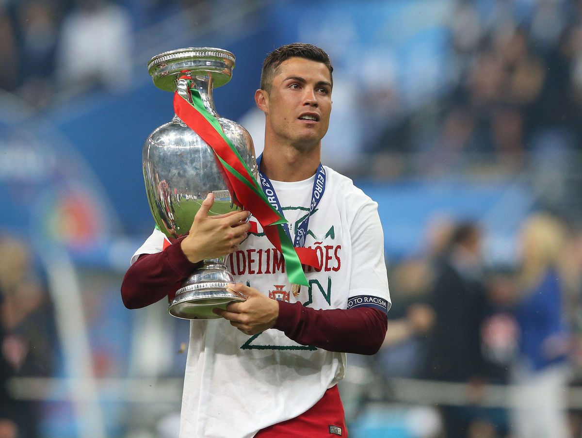 Portugal captain Cristiano Ronaldo holds the Henri Delaunay trophy after Portugal won Euro 2016