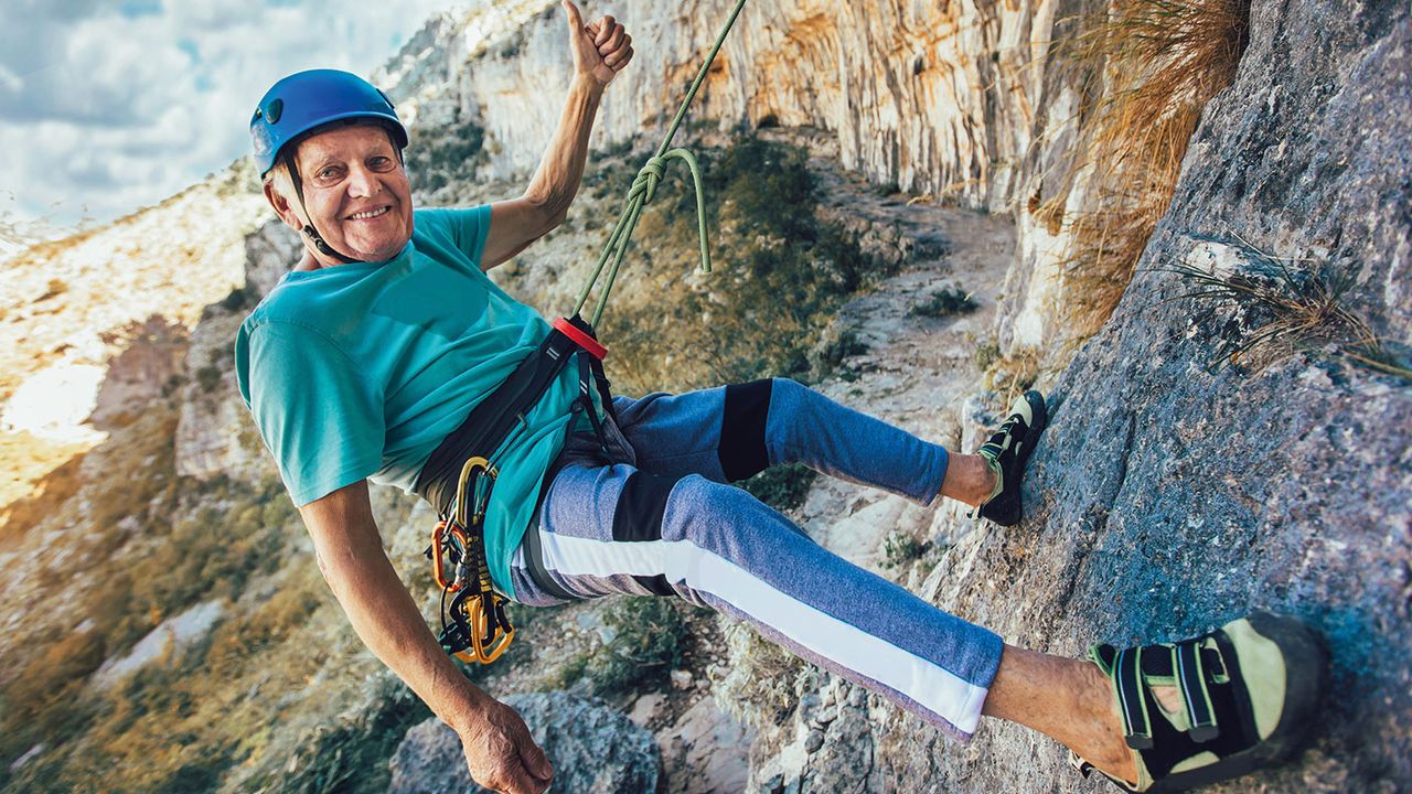 Old man rock-climbing 